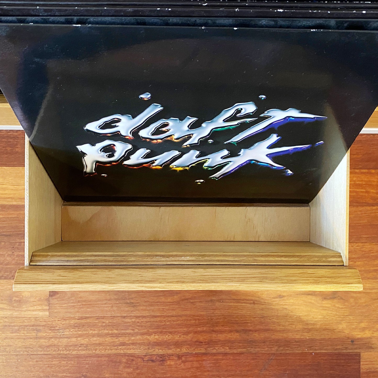 Top down view of an opened The Bale vinyl record drawer that shows how the slide inserts prevent records from slipping forward