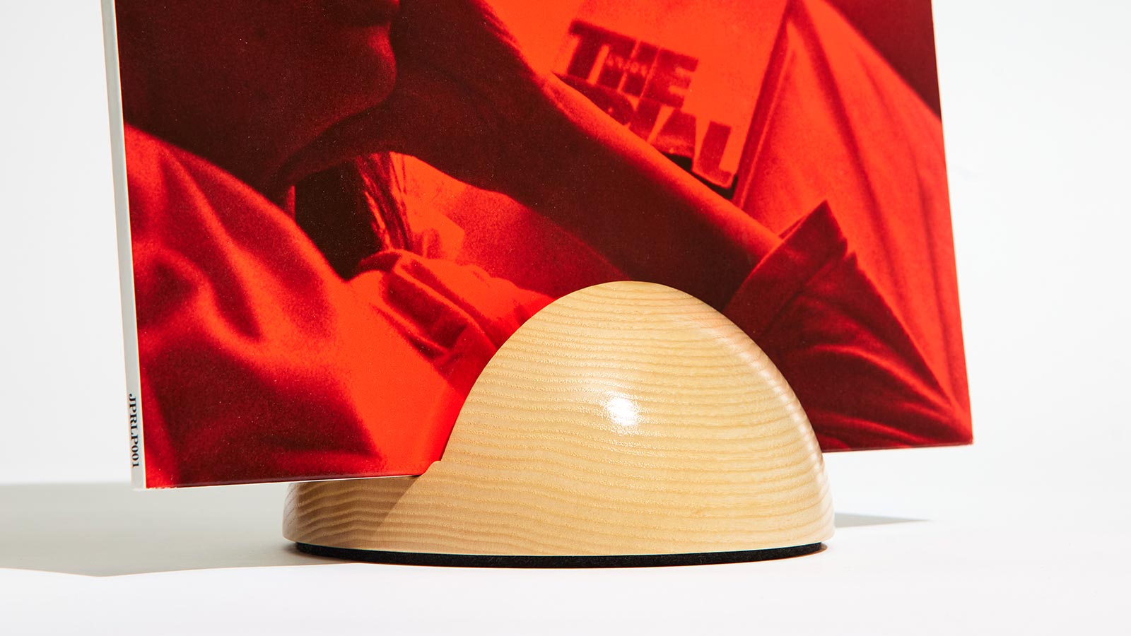 Hemisphere vinyl record stand blending craftsmanship and style