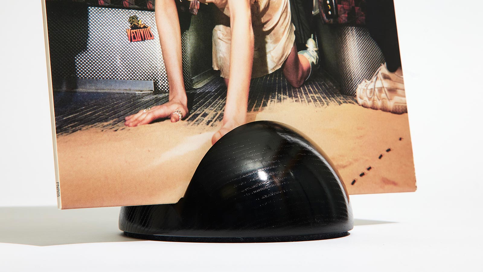 High-gloss vinyl record stand with a smooth finish