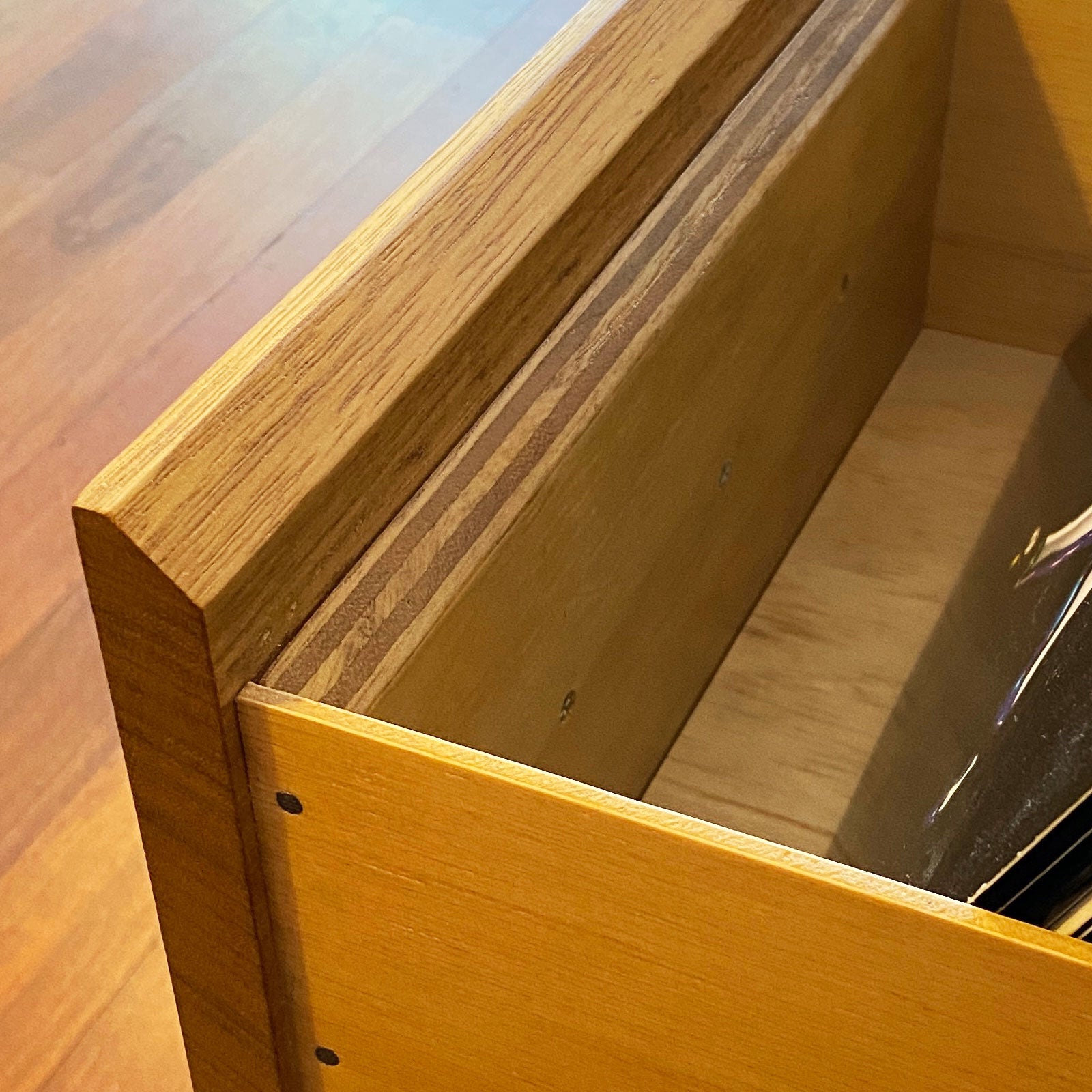 Close up photo of The Bale drawer front that shows the design, angle and construction of the front panel