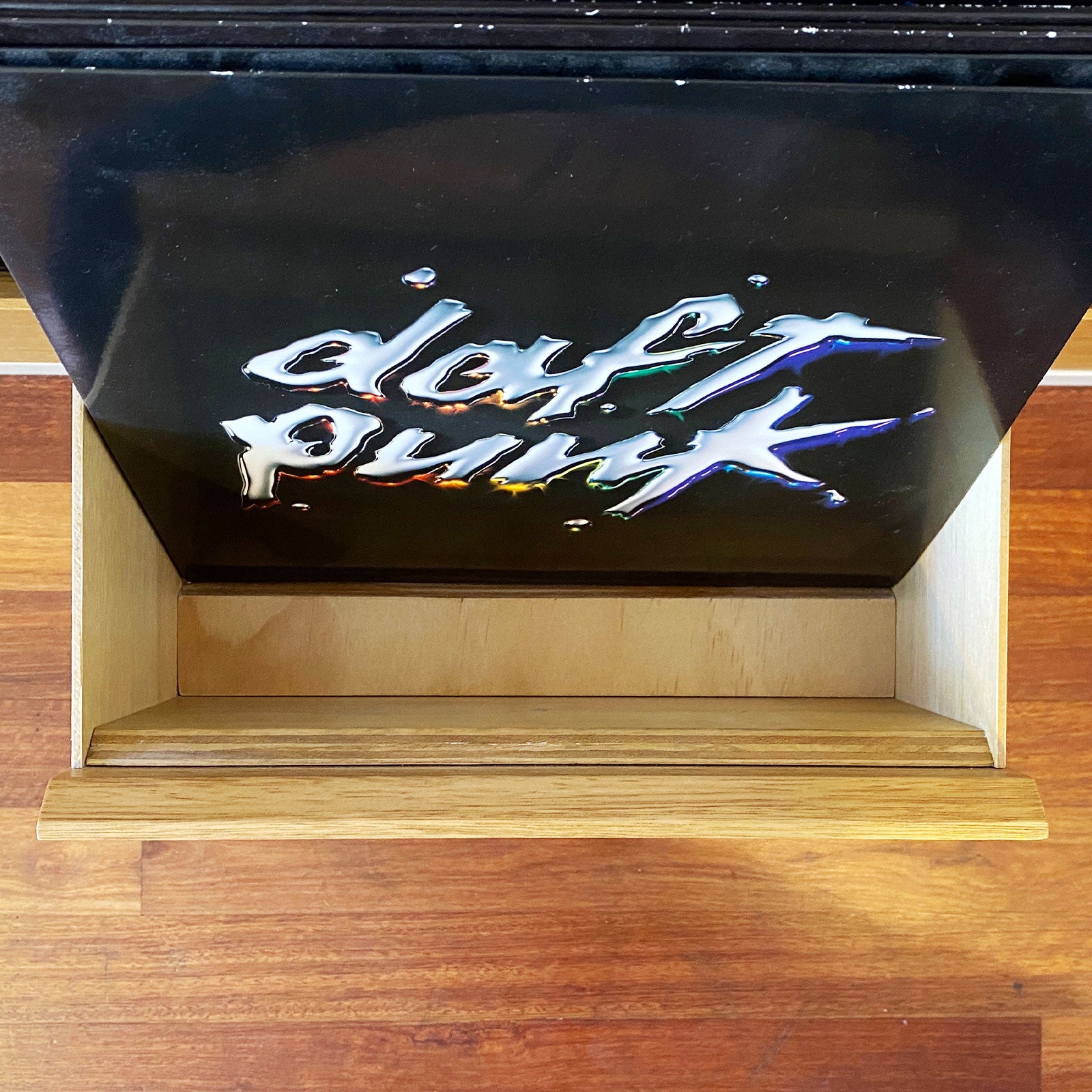 Top down view of an opened The Bale vinyl record drawer that shows how the slide inserts prevent records from slipping forward